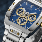 Guess Phoenix GW0456G5 ساعة بسوار فضي وعقارب زرقاء متعددة الوظائف