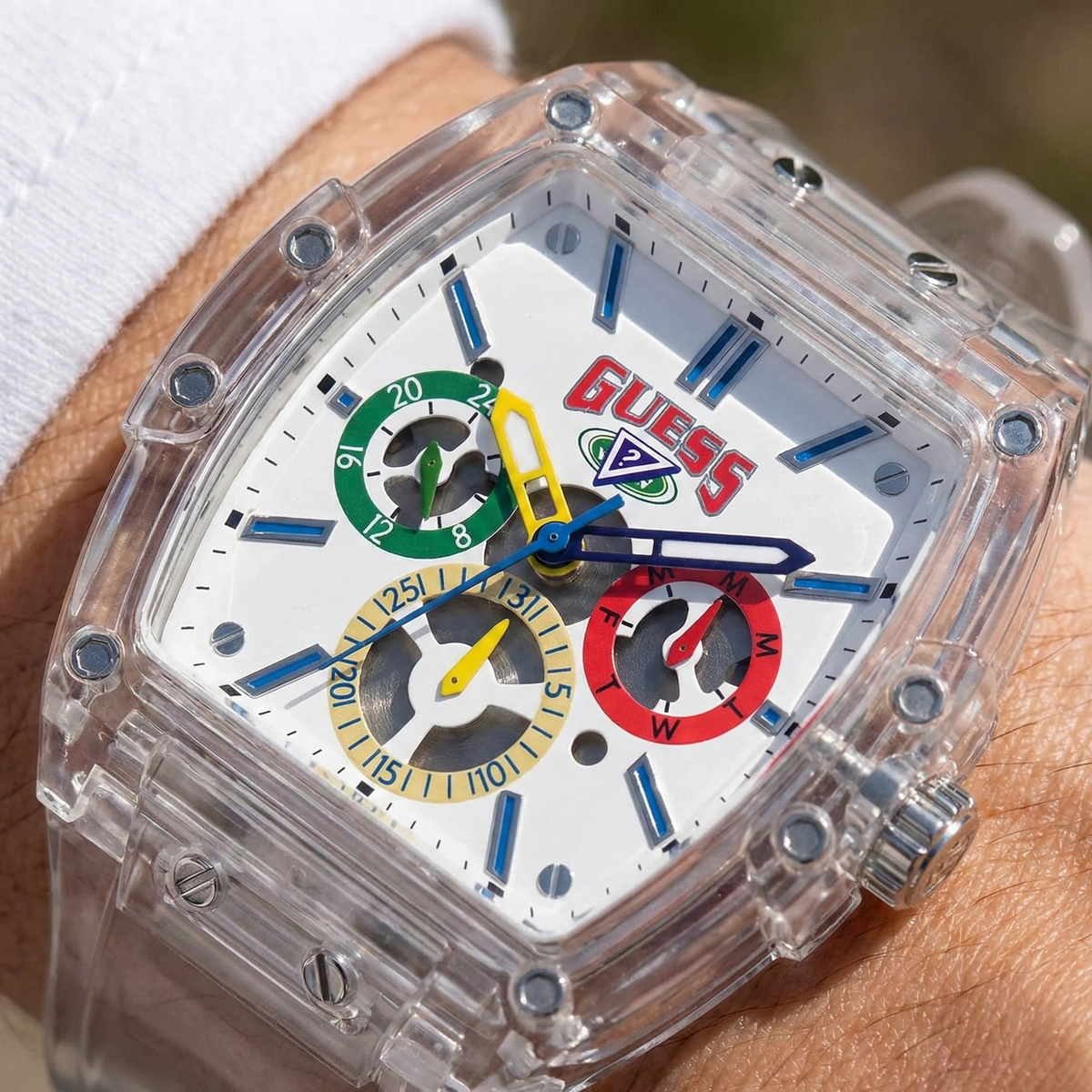 ساعة Guess Originals Phoenix V1051M1 بمينا أبيض وإطار شفاف متعدد الألوان