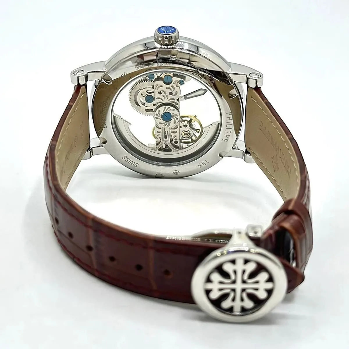 ساعة رجالية من Patek Philippe بهيكل مفتوح وسوار جلدي بني